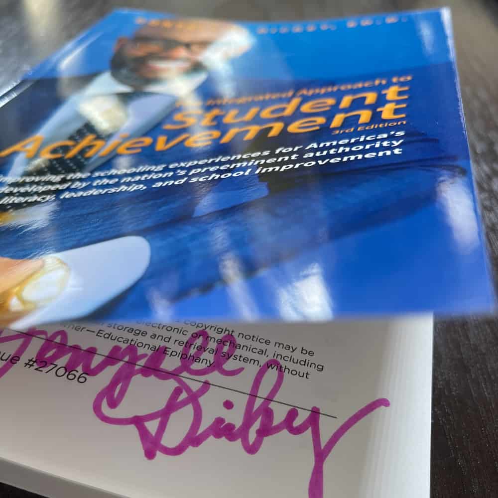 Student achievement book by Donyall Dickey with autograph