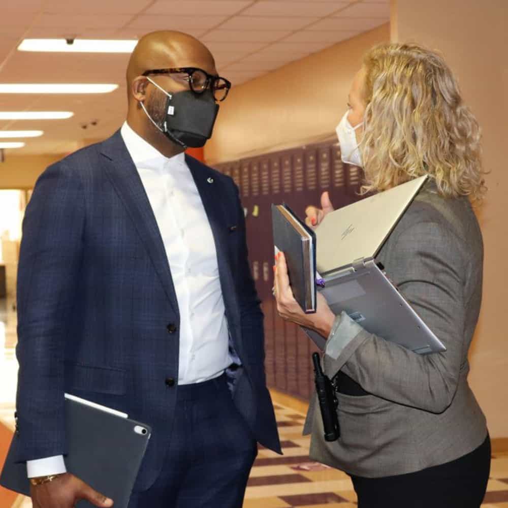 woman with blonde hair speaking with Dr. Dickey